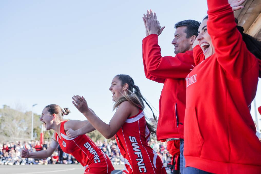 South Warrnambool's bench, including coach Will Jamison, erupts after winning the 2023 Hampden league open netball grand final. Picture by Anthony Brady 