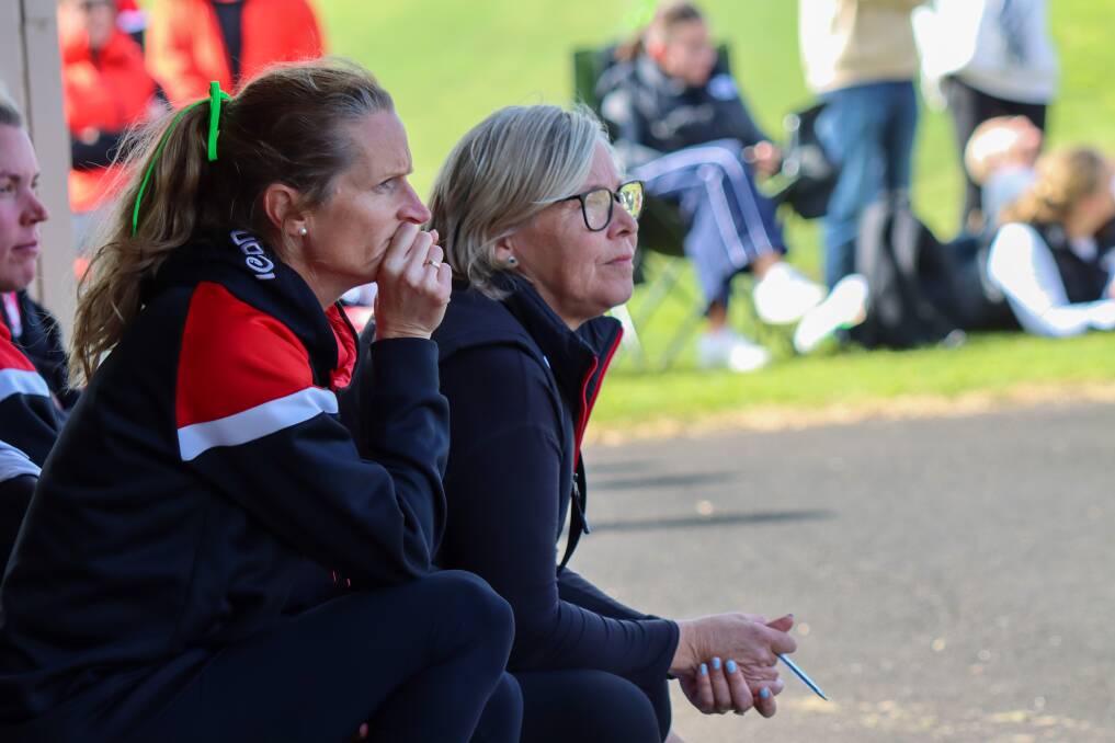Koroit co-coaches Kate Dobson and Kerri Jennings watch an open grade game from the bench in 2023. Picture by Justine McCullagh-Beasy