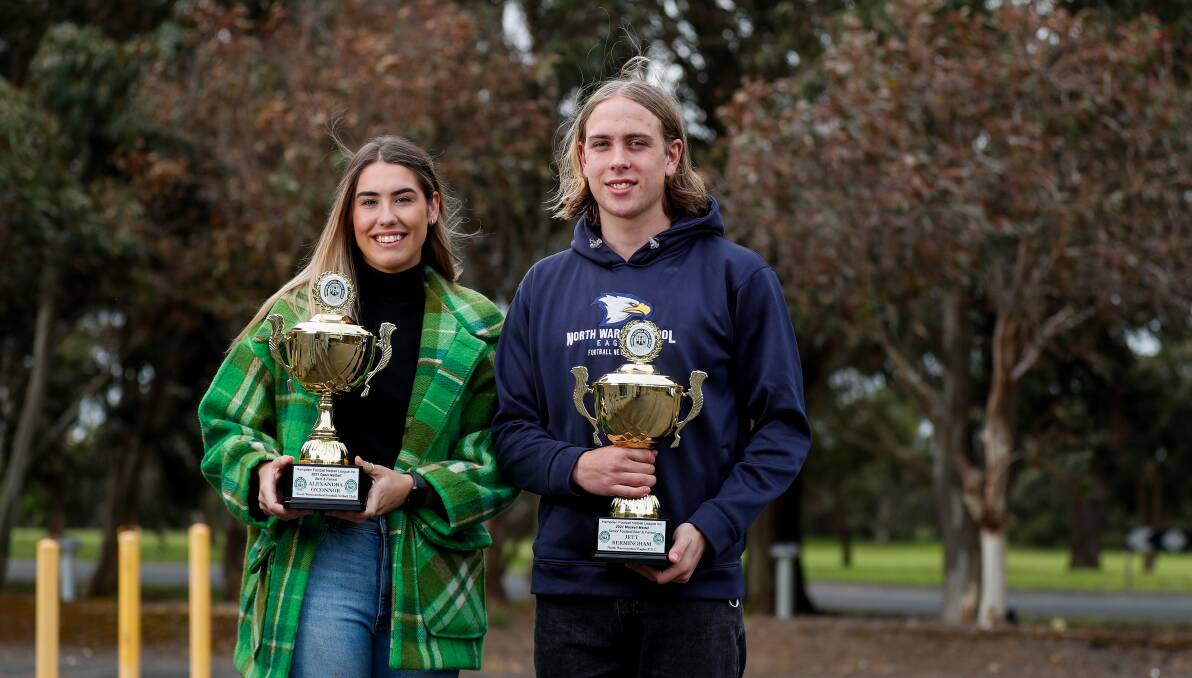 DYNAMIC DUO: Ally O'Connor (open netball) and Jett Bermingham (senior football) with their best and fairest trophies. Picture: Morgan Hancock 