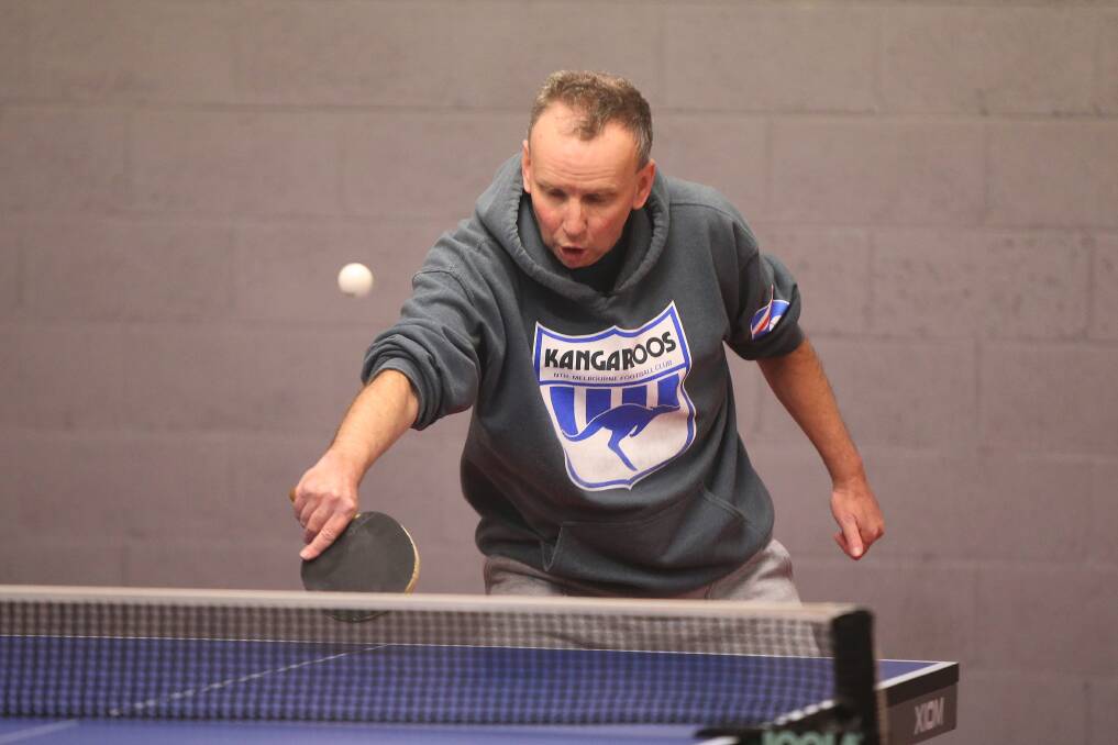HAVING A HIT: Warrnambool's Neil Ford enjoys a game at Warrnambool Table Tennis Association's Cramer Street complex earlier this year. Picture: Mark Witte 