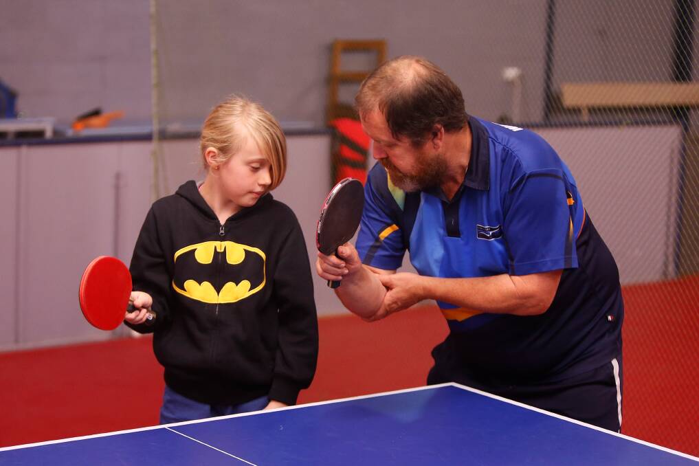TIPS: Allansford's Brianna Woodbridge gets some advice from Warrnambool table tennis player Mark Taylor earlier this year. Picture: Mark Witte
