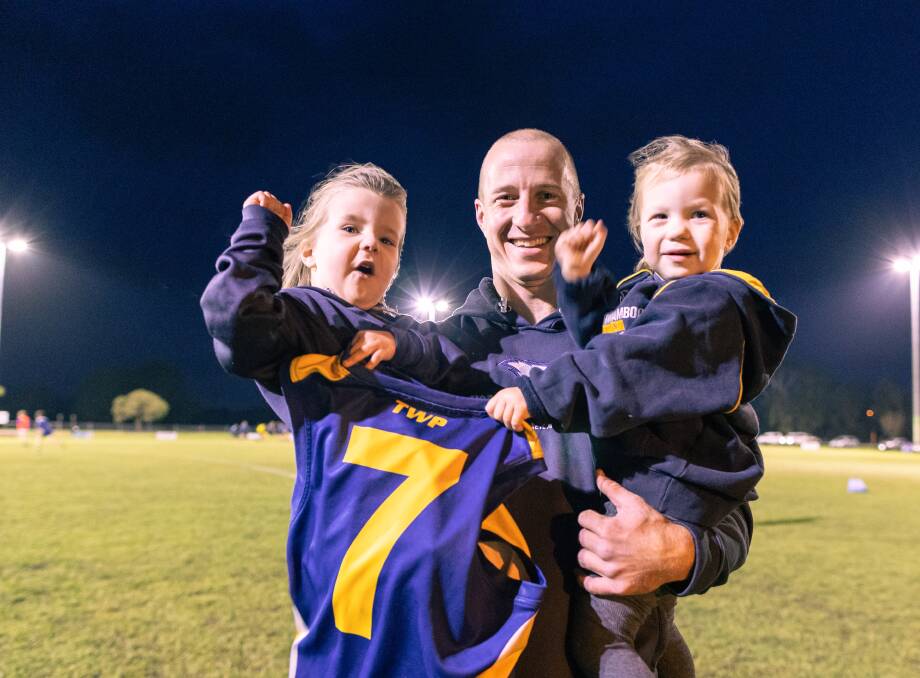 North Warrnambool Eagles footballer Matthew Wines, pictured with daughters Isla, 3, and Amelia, 2, will play his 300th game on Saturday. Picture by Sean McKenna 