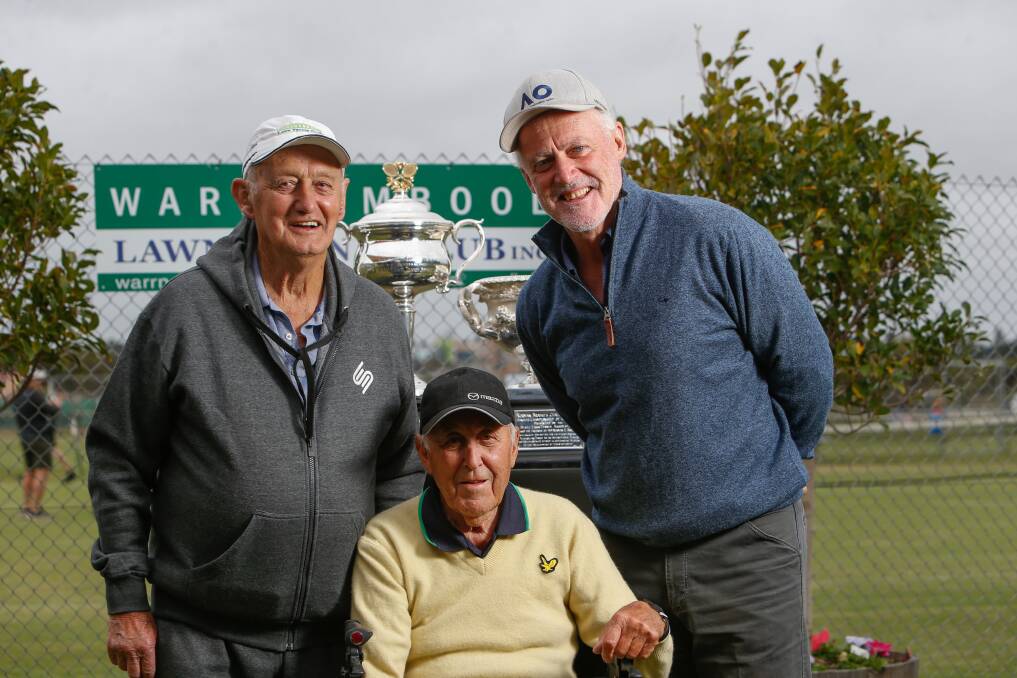 SPECIAL MOMENT: Former Warrnambool tennis players Len Barker, 85 and Bill Mountjoy, 90, with John Fitzgerald and the Australian Open trophies. Picture: Emma Stapleton 