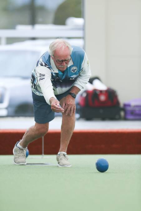 CLOSE FINISH: Port Fairy Gold player Bob Mallett rolls down a bowl on Tuesday. Picture: Chris Doheny