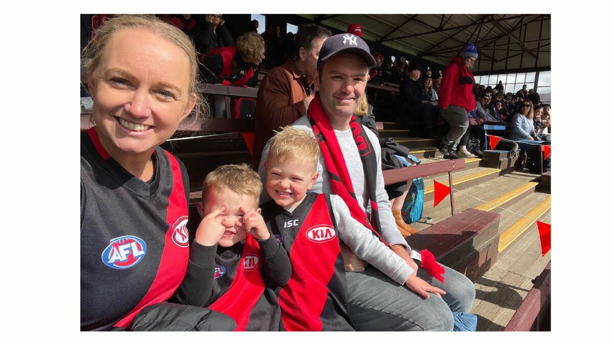 Essendon coach Natalie Wood says family, including sister Ebony, nephews Sullivan and Rafferty and brother-in-law Matthew Lynch, are following her journey with the Bombers. 