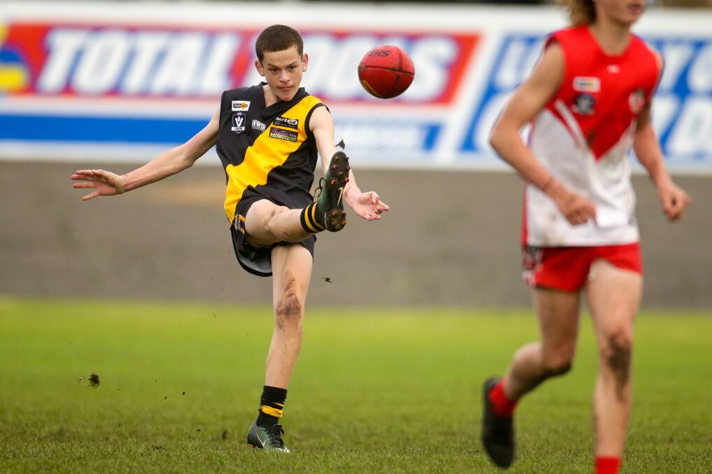 KICKING ON: The Hampden league would like to see more youngsters, like Portland under 16 player Cooper McCallum, playing football. Picture: Chris Doheny 