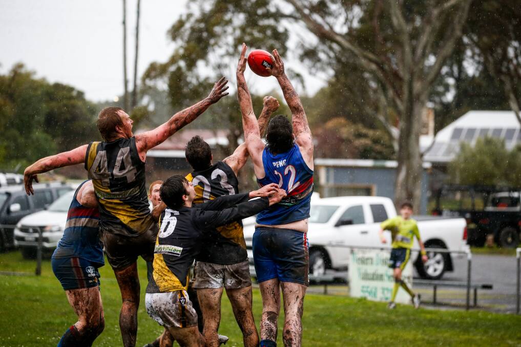 REACH: Panmure's Kallan Melican takes a mark. He suffered a corkie. Picture: Anthony Brady

