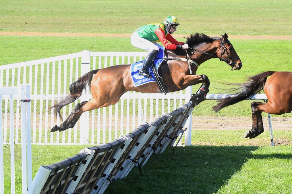 Braidon Small clears a hurdle on the way to winning at Casterton on Sunday. Picture by Pat Scala/Racing Photos 