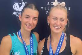 Bella Pasquali (first) and Warrnambool's Layla Watson (second) after their Athletics Victoria track and field championships under-20 400m final. Picture supplied 
