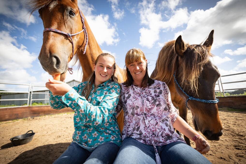 Asha and Carly Loughnan have a passion for horses. Picture by Sean McKenna 