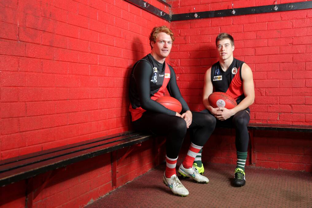 WHERE IT ALL BEGAN: Geelong forward Gary Rohan, who at that stage played for Sydney, and Essendon midfielder Zach Merrett during a visit home to Cobden in 2015. 
