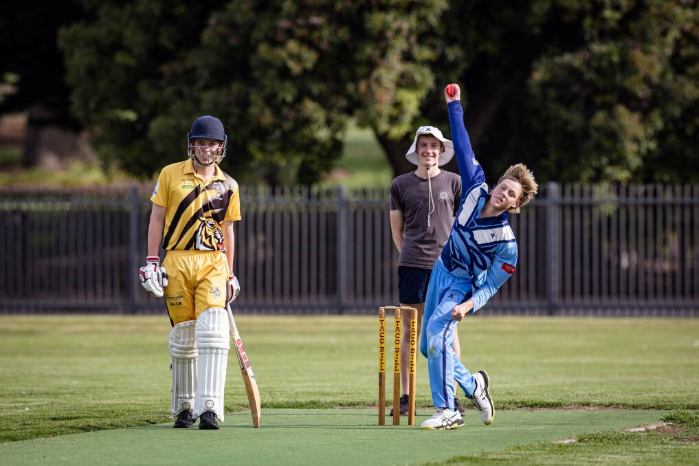Hudson Owen (right) bowling for Wesley in an under 17 game earlier this season. Picture by Sean McKenna 