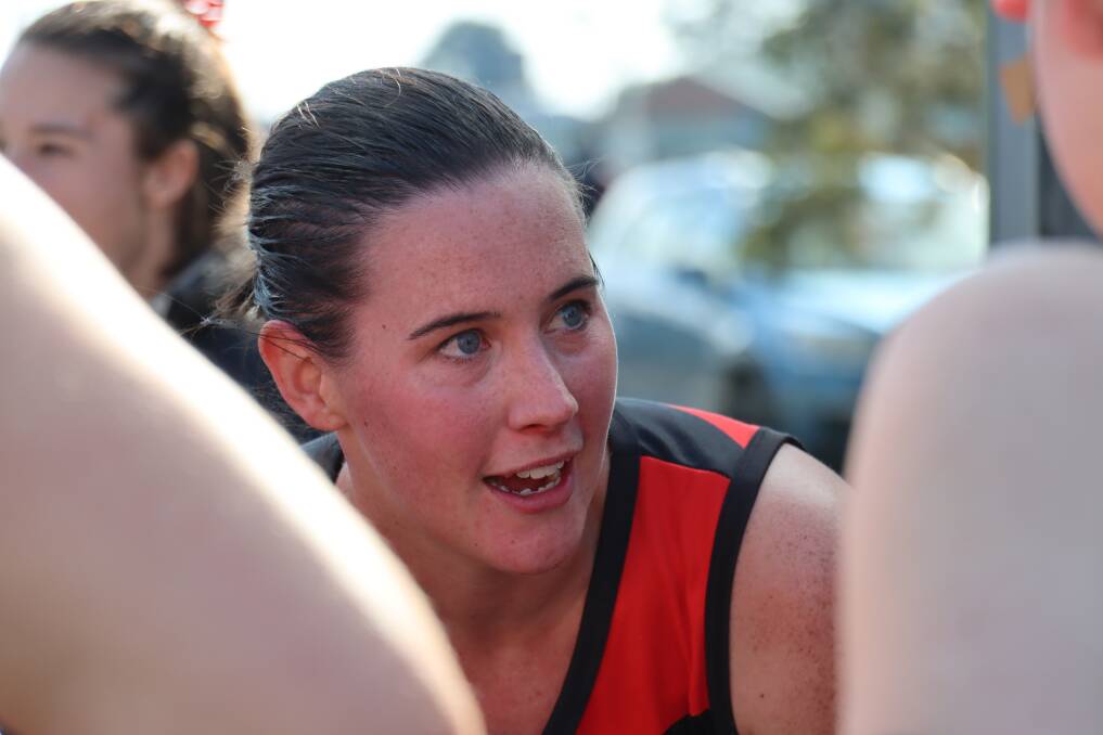 GAME DAY: Sophie Hinkley talks to her players at quarter-time on Saturday. Picture: Justine McCullagh-Beasy