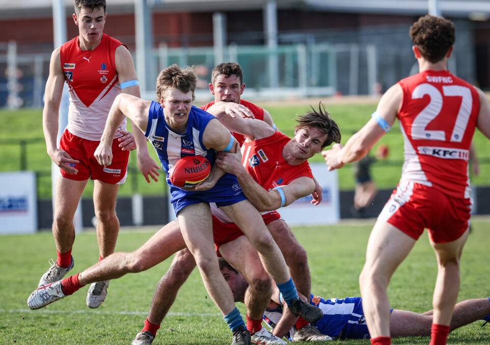 Noah Herrmann charges through a pack for Hamilton Kangaroos. He's one of the club's emerging players. Picture by Sean McKenna 