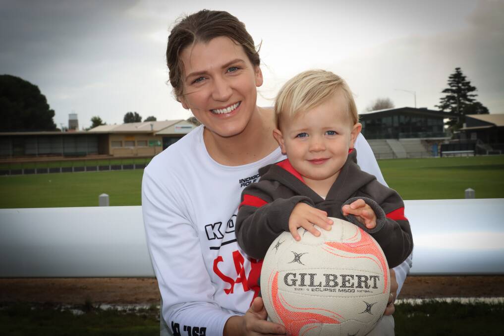 Kasey Barling with son Jude, 2, at Warrnambool Reid Oval on Monday. Picture by Justine McCullagh-Beasy 