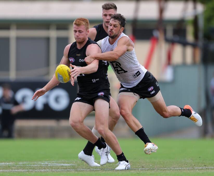 TOUGH COMPETITION: Willem Drew battles Port Adelaide teammate Travis Boak during an intraclub practice match earlier this year. Picture: Getty Images 