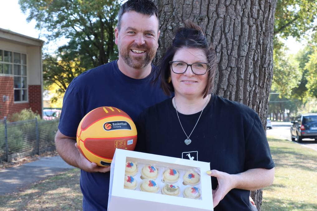 HUMBLED: Jason and Amy Stephenson with items donated for a brain cancer fundraiser in their late son Lachlan's honour. Picture: Justine McCullagh-Beasy 