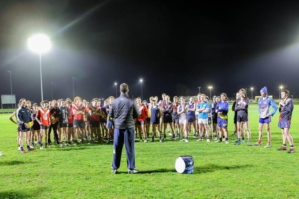 Footballers from all Hampden league clubs listen to AFL great Jonathan Brown at interleague training in 2023. Picture by Anthony Brady 