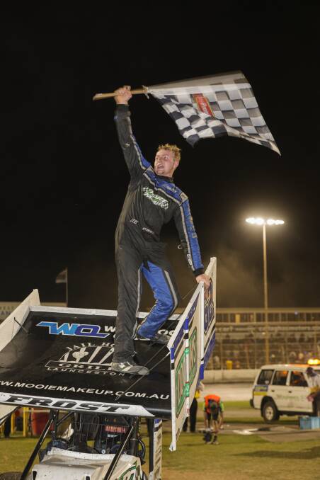 Tate Frost celebrates his night one classic A-Main win. Picture by Sean McKenna 