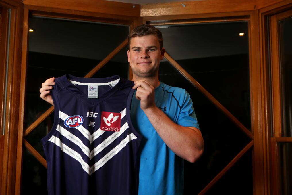 HEAVE HO: Sean Darcy on AFL draft night in 2016 after Fremantle picked him to join its ranks. 