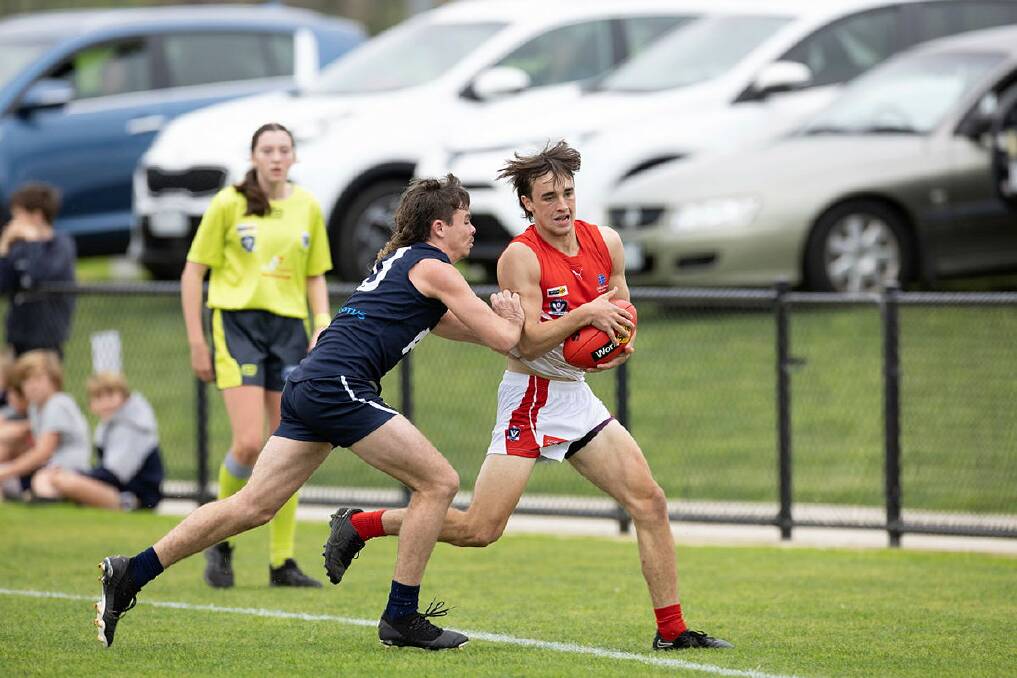South Warrnambool's Max Irving gathers the ball near the boundary line during a clash against Warrnambool in 2023. Picture by Eddie Guerrero 