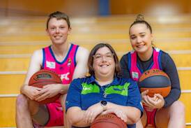 Warrnambool Basketball's Jess Bonham (middle) will shave her head for charity. She is pictured with players Harry McGorm and Mia Mills at Warrnambool Stadium. Picture by Eddie Guerrero 
