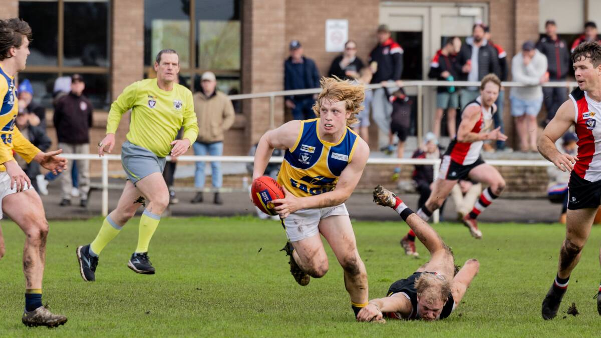 North Warrnambool Eagles' Judah Greene escapes his opponent's grasp. Picture by Anthony Brady