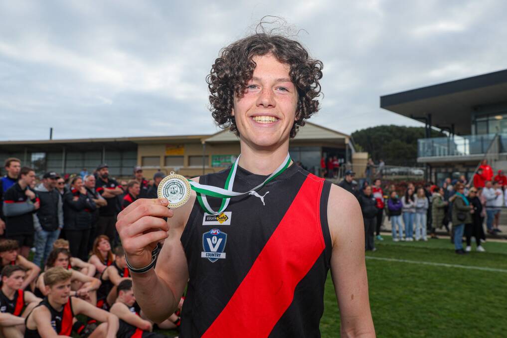Cobden's Hamish Dean with his best-on-ground medal for his performance in the under 16 grand final. Picture by Eddie Guerrero 