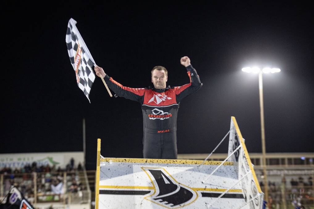 Jamie Veal waves the victory flag after winning on New Year's Day. Picture by Sean McKenna 