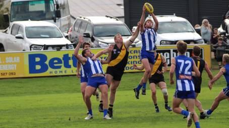 Hamilton Kangaroos' Harry McGinley reels in a mark against Portland on Anzac Day. McGinley was the Roos' best. Picture by Tayla Ness 