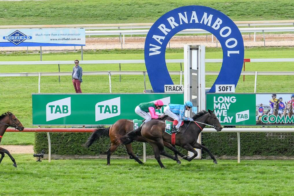 CLOSE CALL: Icantoo, with Craig Williams in the saddle, wins a two-year-old handicap at Warrnambool on Wednesday just ahead of teh Jim Madden-trained War Na Bool (Brad Rawiller). Picture: Alice Laidlaw/Racing Photos