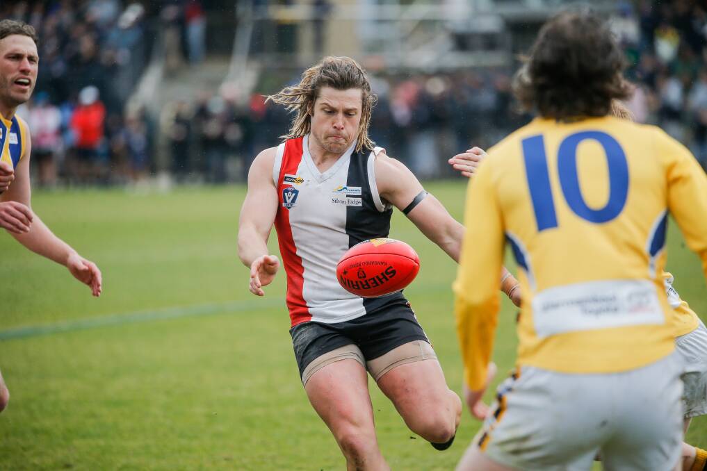 Dylan McCutcheon kicks Koroit forward during the grand final. Picture by Anthony Brady 