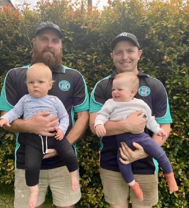 Louis Cahill, with son Ted, and Jake Evans, with son Finn, have joined Kolora-Noorat. Picture supplied 