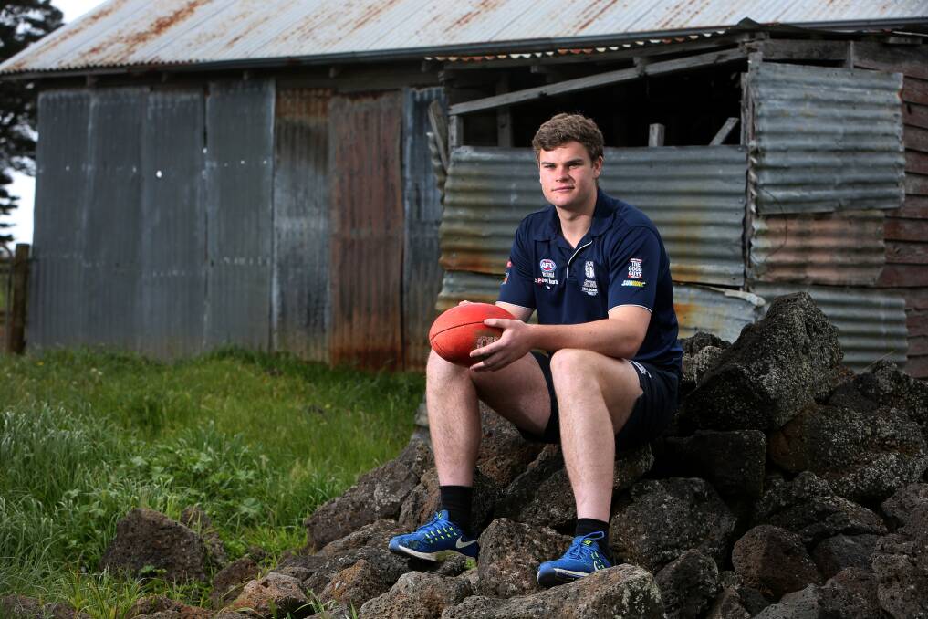 FARM LIFE: Sean Darcy, who played for Geelong Falcons, at his family's South Purrumbete property before the 2016 AFL draft. 
