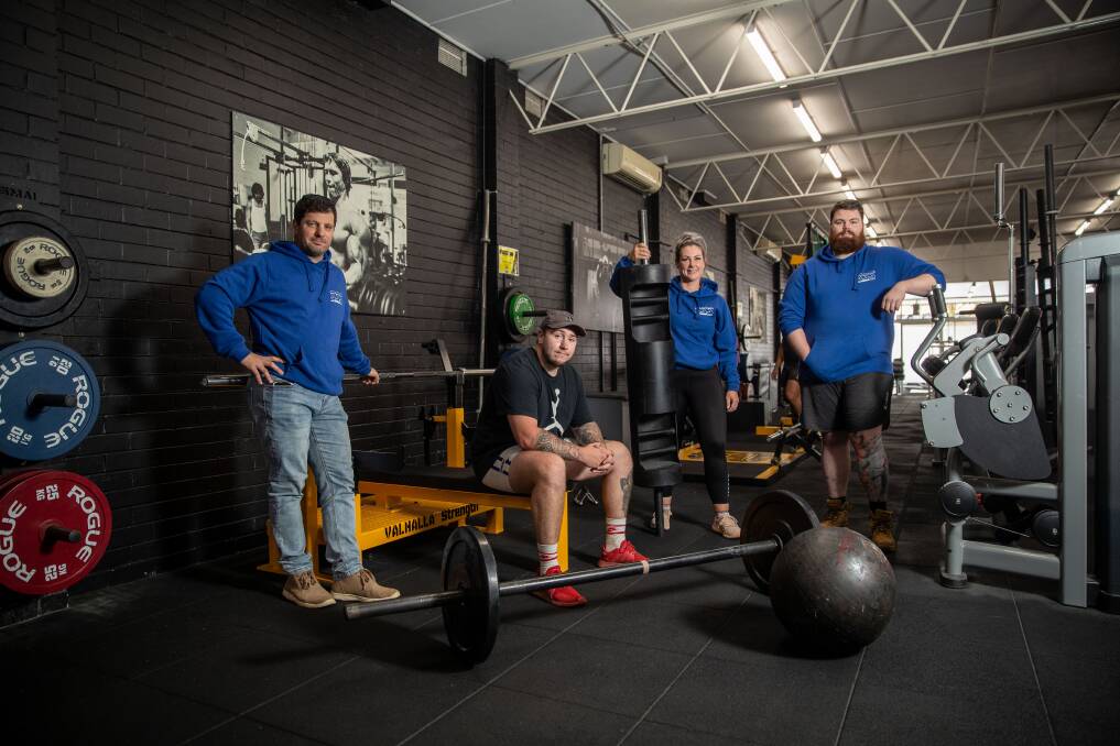 UP FOR THE CHALLENGE: South West Strength Sports' Paul Mammone, Luke Featherby, Liz Aitken and Simon Gray at Iron Armour Gym in Warrnambool. Picture: Morgan Hancock