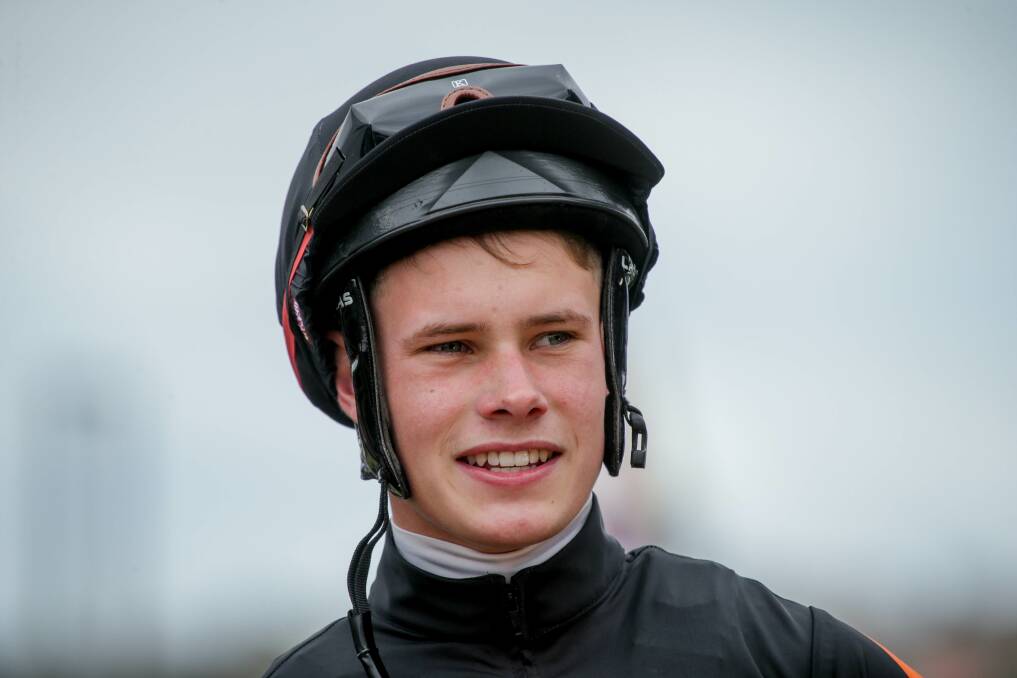 WINNING POST: Tintinwin jockey Lachlan Neindorf was all smiles after winning the first race on Wednesday. Picture: Chris Doheny