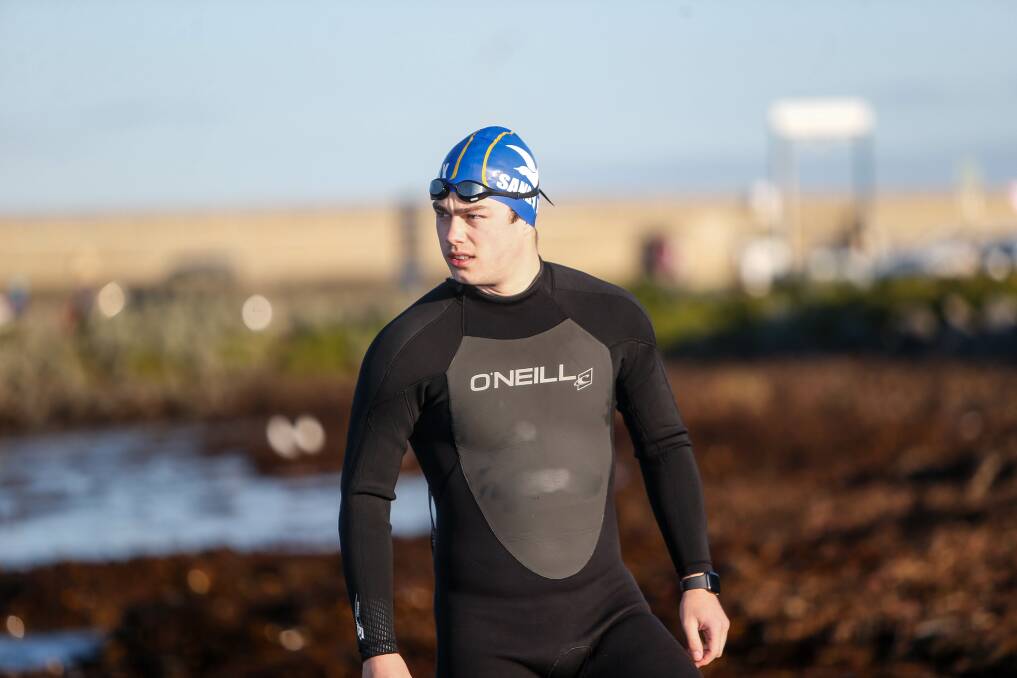 WATER WORLD: Warrnambool Swimming Club member Jack Sharp is training at the beach. Picture: Anthony Brady 