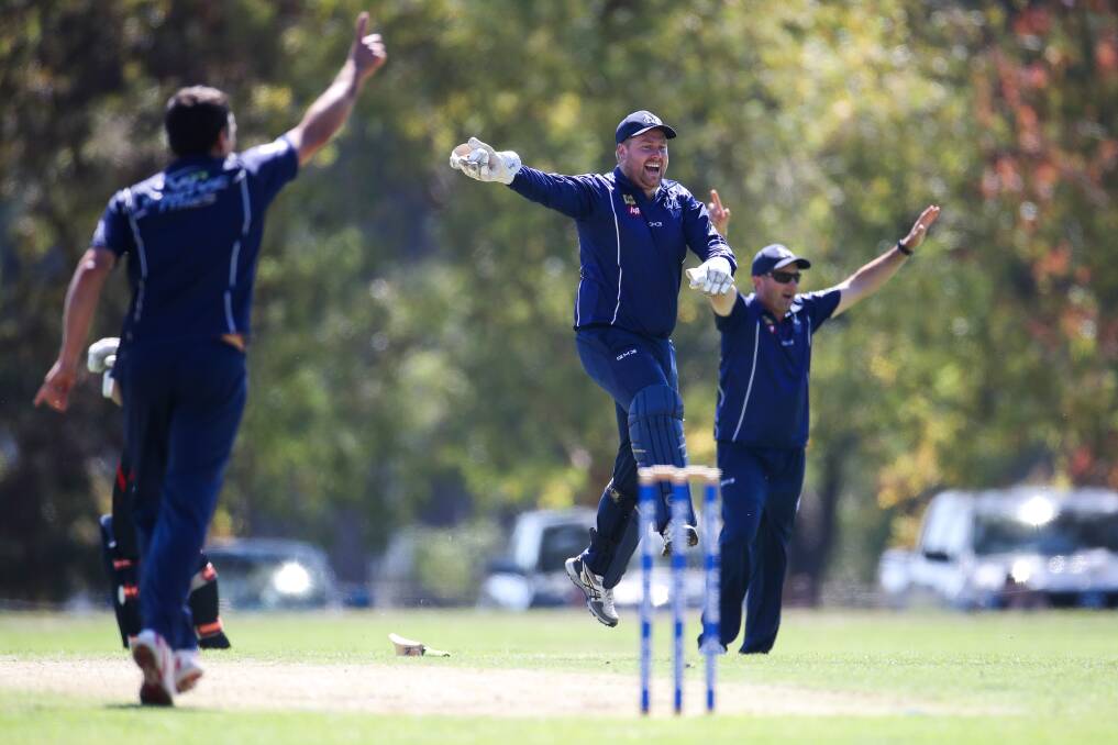 JUMPING FOR JOY: Mortlake president Jimmy Tarbolton celebrates a wicket during the Cats' most recent campaign. Picture: Morgan Hancock 