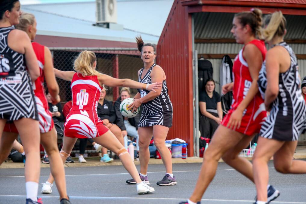 DETERMINED: Tracey Baker playing Hampden top-grade netball aged 46 in 2021. Picture: Chris Doheny