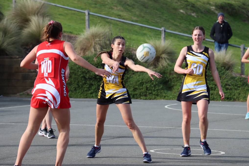 QUICK PASS: Portland's Madeline Stone sends the Tigers into attack against South Warrnambool. Picture: Justine McCullagh-Beasy