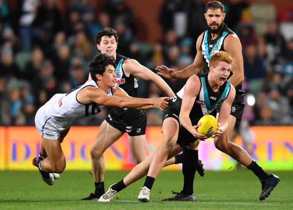 IN AND UNDER: Tough midfielder Willem Drew is considered one of Port Adelaide's brightest young players. Picture: Getty Images