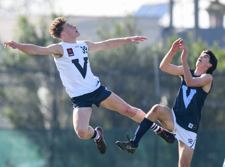 AIR TIME: Josh Rentsch (left) spent time in the ruck during a Vic Country versus Vic Metro under 18 game earlier this year. Picture: Morgan Hancock 