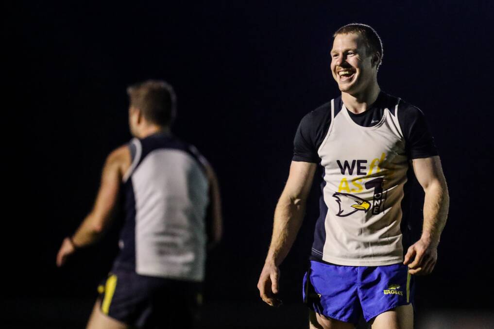 HAVING A LAUGH: Adam Wines enjoys spending time with his mates at North Warrnambool Eagles' training on Thursday night. Picture: Morgan Hancock 