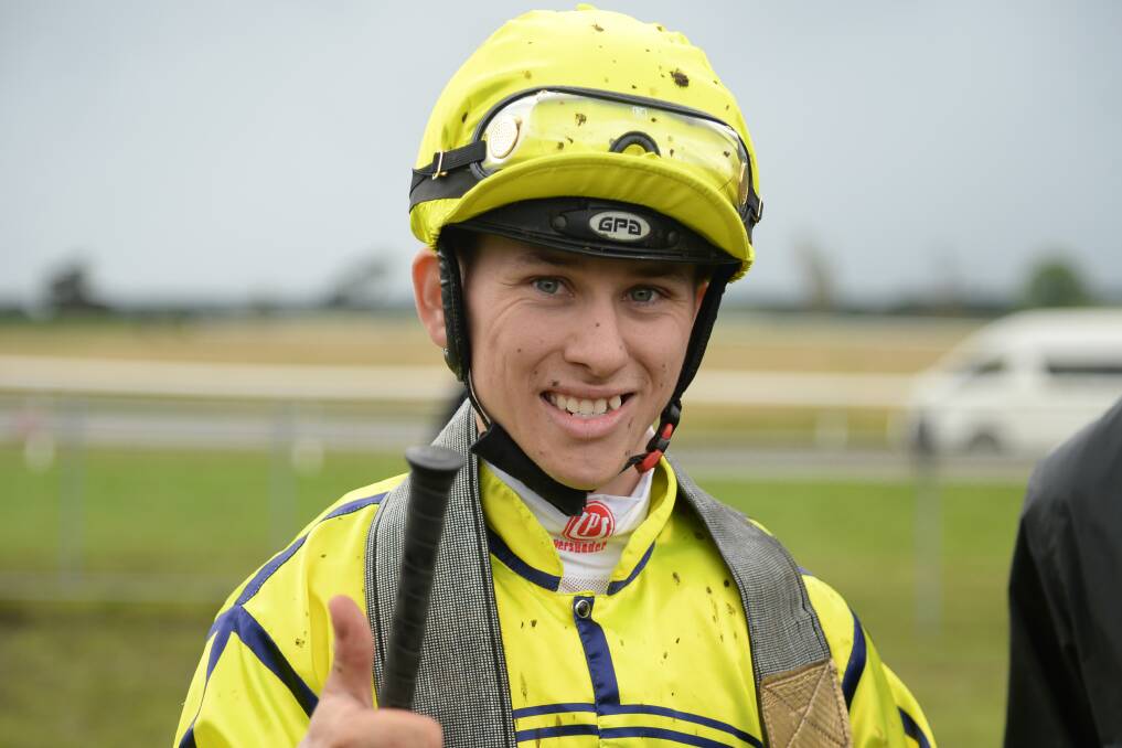 Harry Grace was all smiles after winning the Penshurst Cup. Picture by Ross Holburt/Racing Photos) 