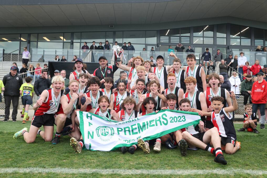 Koroit's defiant under 16 football teams enjoys its grand final win. Picture by Eddie Guerrero 
