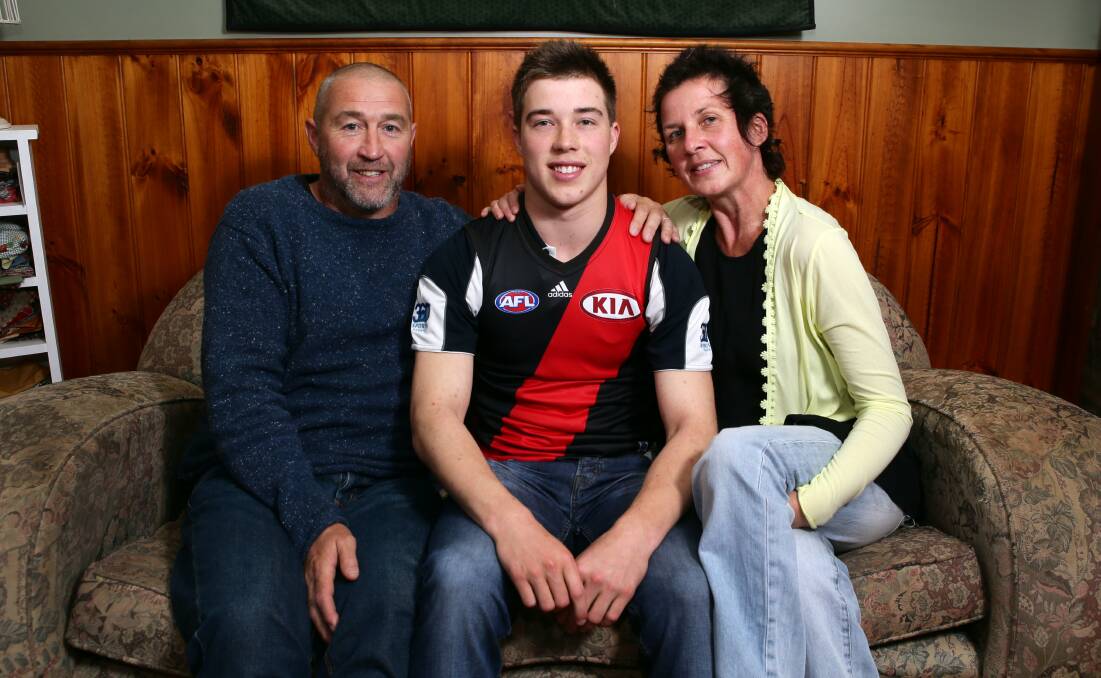 Parents Greg and Cathy Merrett with son Zach when he was drafted in late 2013. File picture 