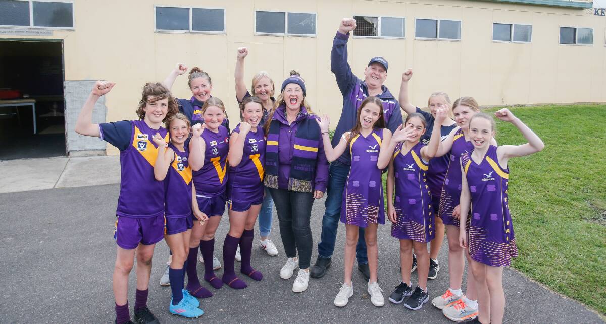 CLUB PRIDE: Giving junior footballers and netballers a game is important to Port Fairy president Noel Black (arm raised). Picture: Anthony Brady 