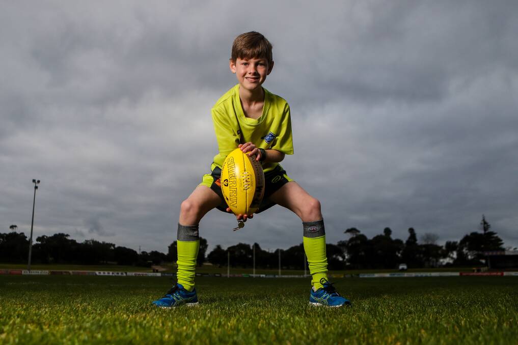 BIG STAGE: Young umpire Michael Lougheed is only 10 but is already making his mark, earning a Hampden league under 18.5 game to run the boundary. Picture: Morgan Hancock