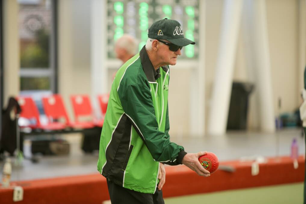 SPORTSMAN: George Fox has played lawn bowls, football, cricket and badminton across his 80 years. Picture: Chris Doheny 