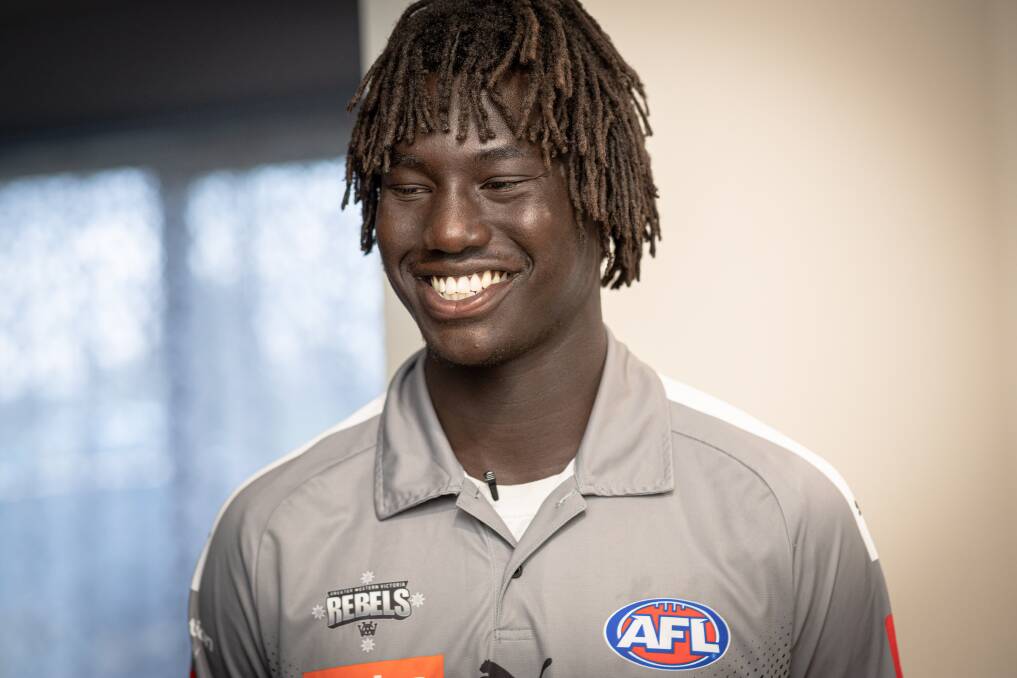 Luamon Lual is all smiles after joining Essendon via the AFL draft. Picture by Sean McKenna 